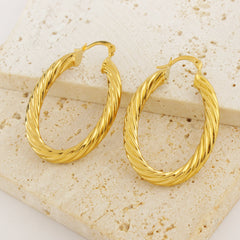 Giovani GOLD NYC 14k Gold Classic Oval Bamboo Hoop Earrings